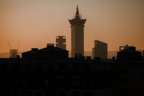 건물, 고층 건물, 노란 하늘의 무료 스톡 사진