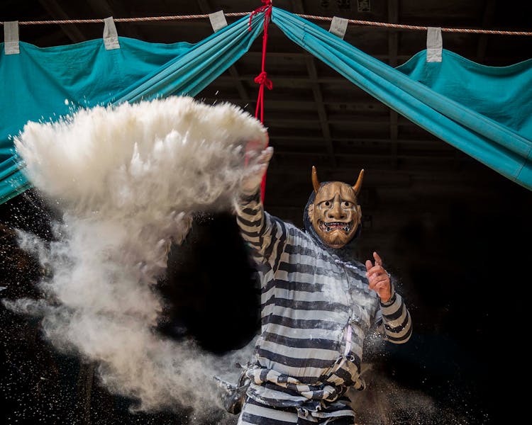 Person Throwing Powder On Festival