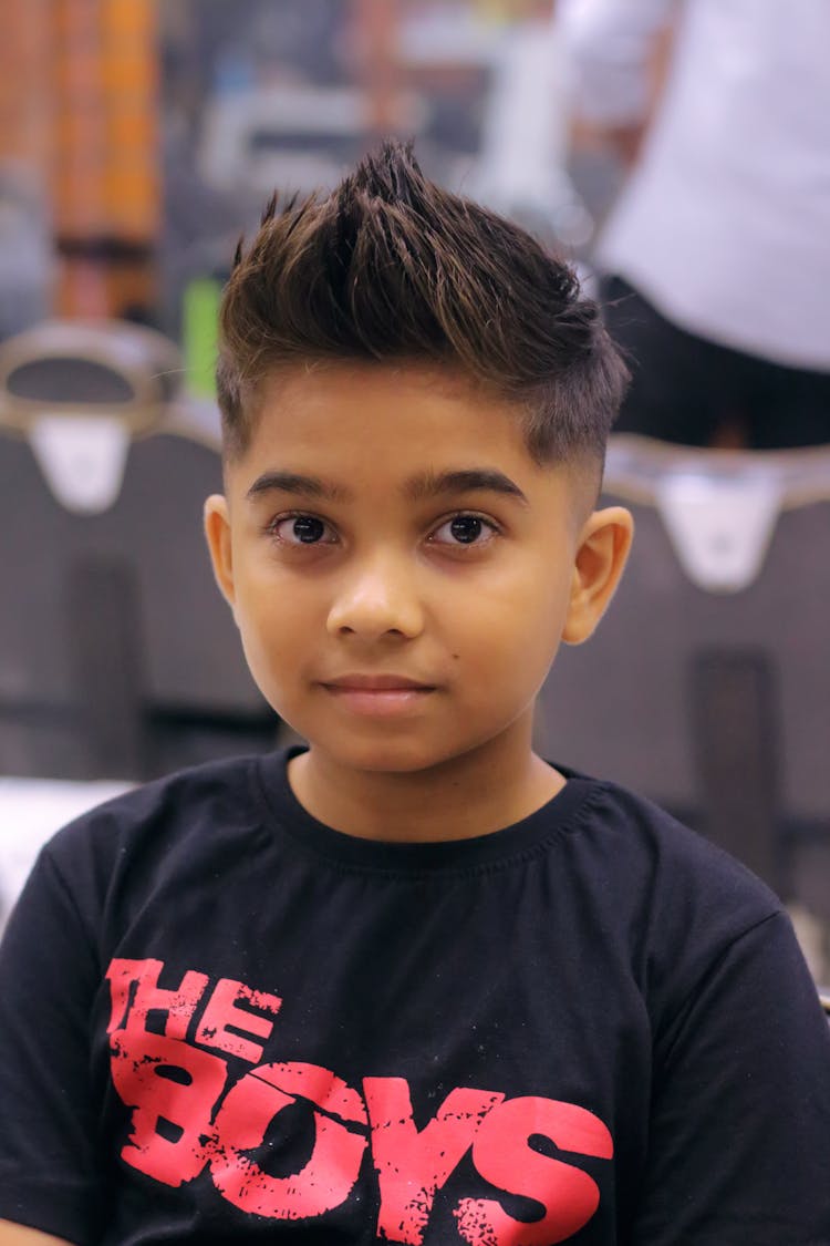 Brunette Teenager Boy With Spiky Brushed Up Hair