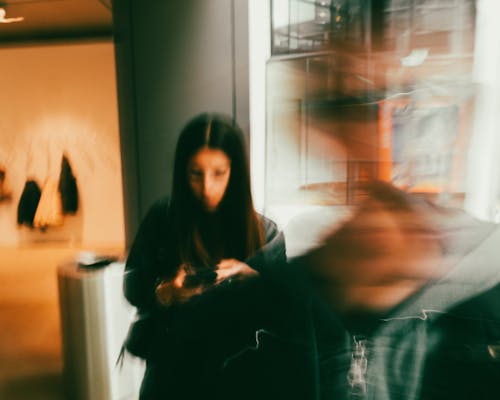 Young Woman Looking at her Phone 