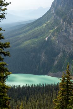 Stunning aerial view of Emerald Lake surrounded by lush forests in Banff National Park, Canada.