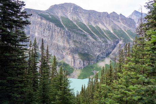 Capture the breathtaking scenery of Lake Louise and Fairview Mountain in Alberta's Banff National Park.
