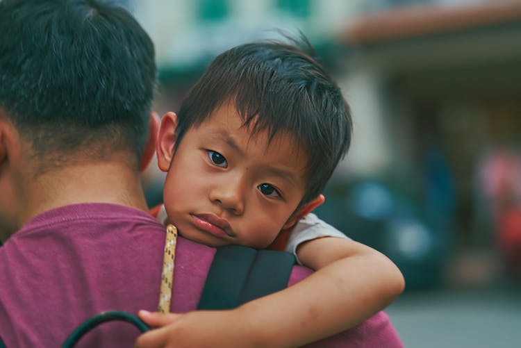 Boy On Father Shoulder