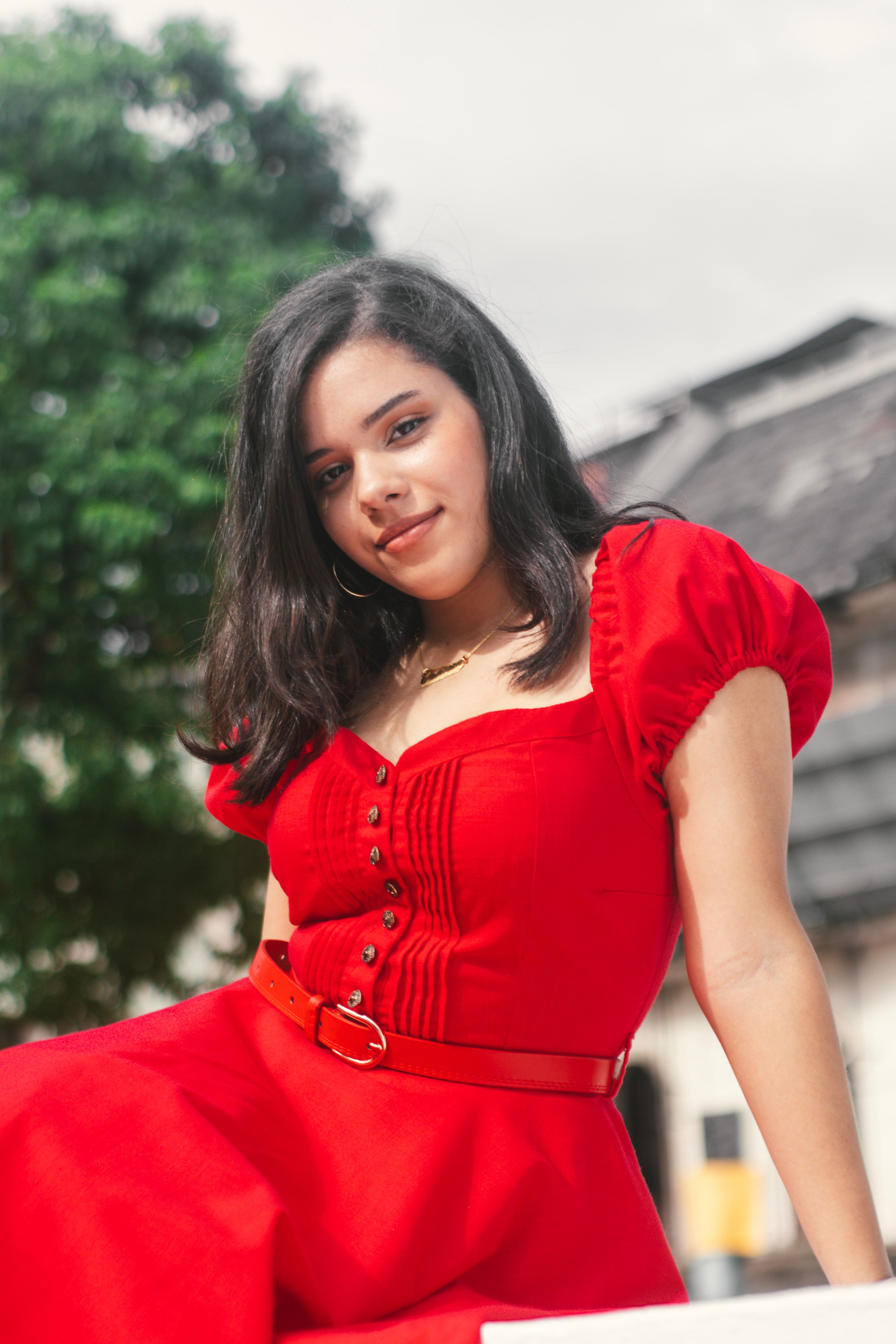 Cute Young Woman in a Red Dress  Free Stock Photo