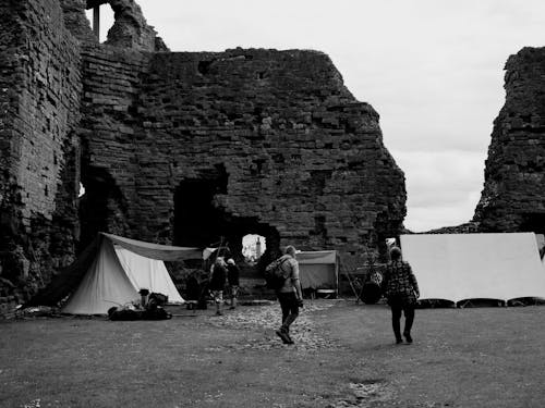 Free People Camping in the Ruins of the Castle Stock Photo