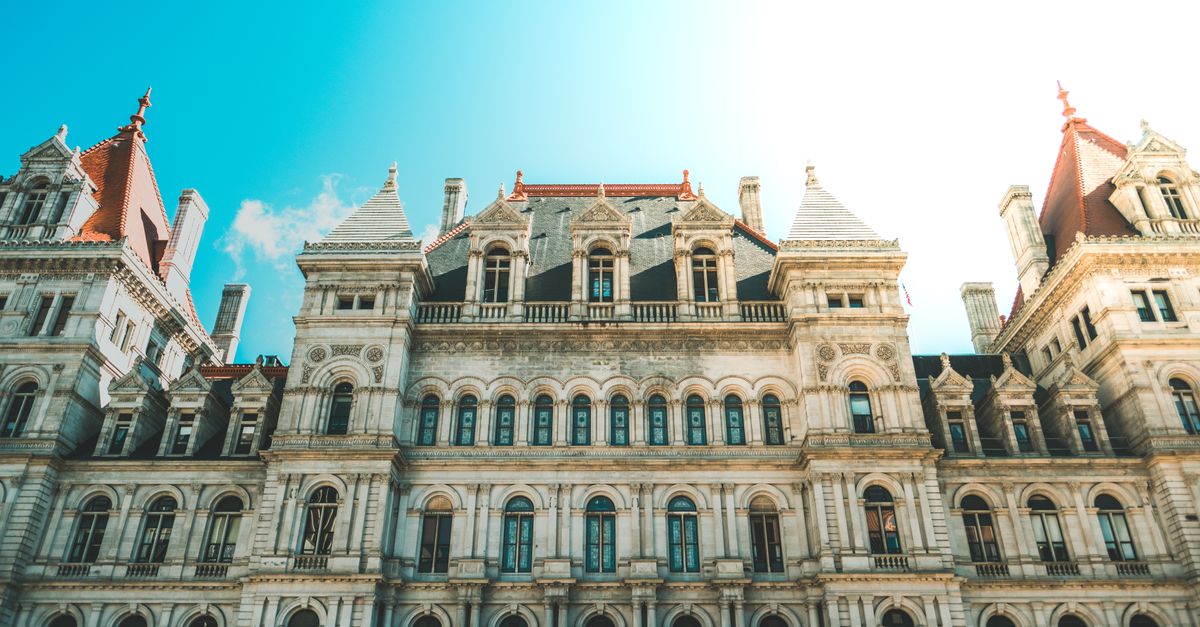 Elegant Renaissance architecture of the New York State Capitol building in Albany under clear sky.