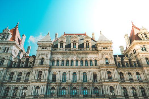 Elegant Renaissance architecture of the New York State Capitol building in Albany under clear sky.