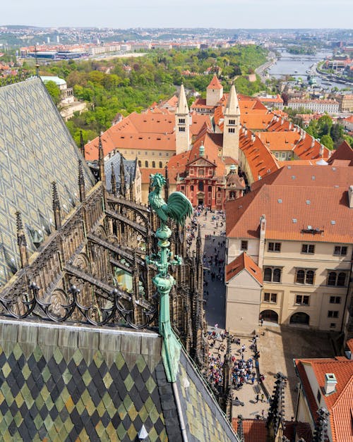 Green Copper Rooster on the Roof of the Gothic Cathedral in Prague
