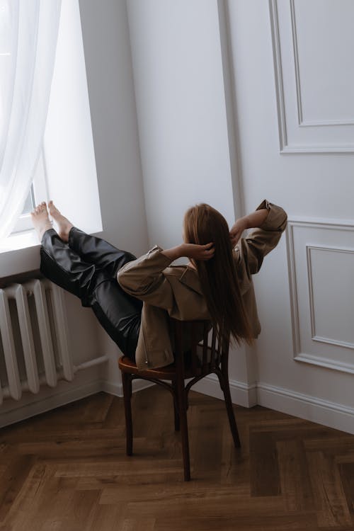 Woman in Beige Leather Jacket and Black Pants · Free Stock Photo