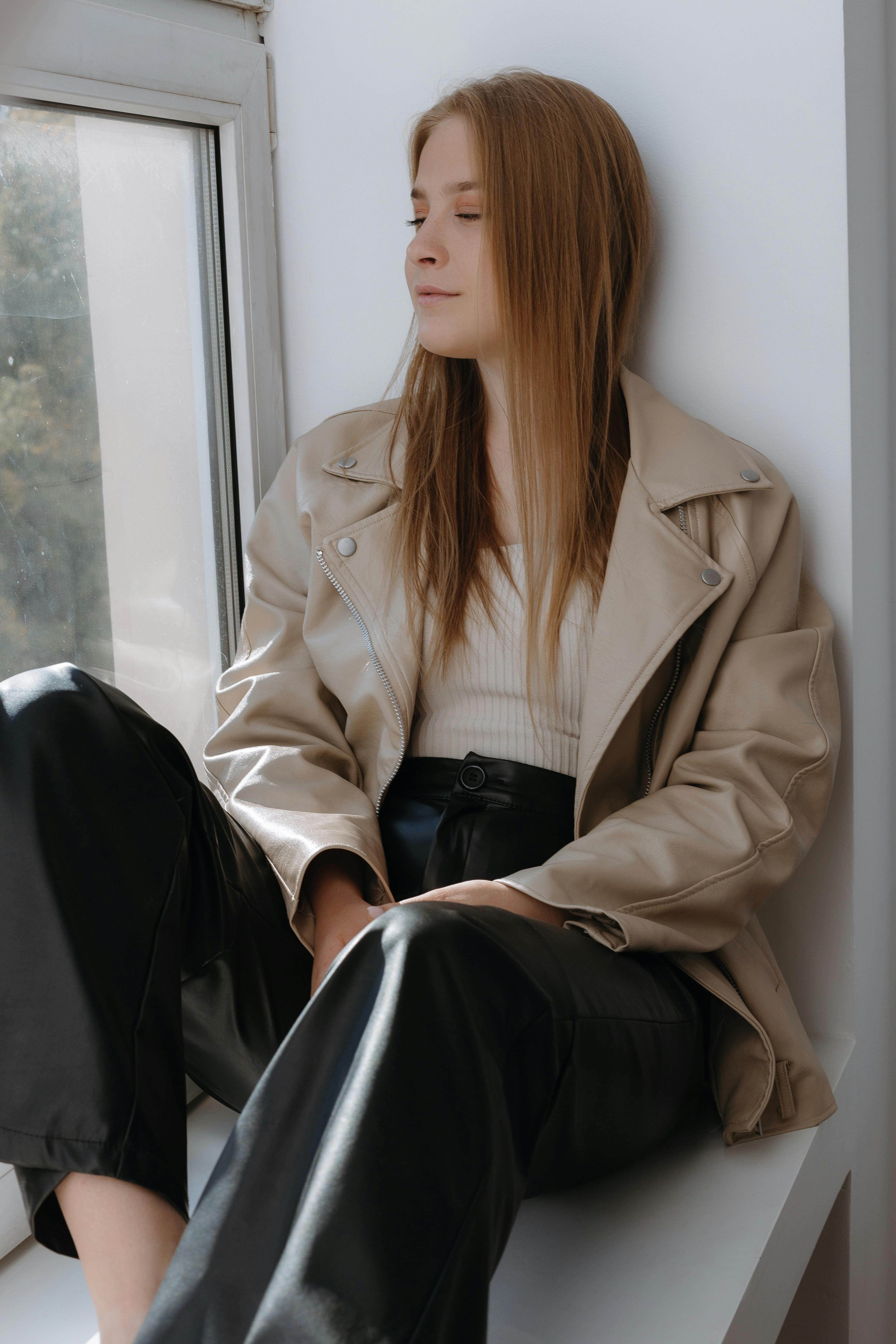 Woman in Beige Leather Jacket and Black Pants · Free Stock Photo