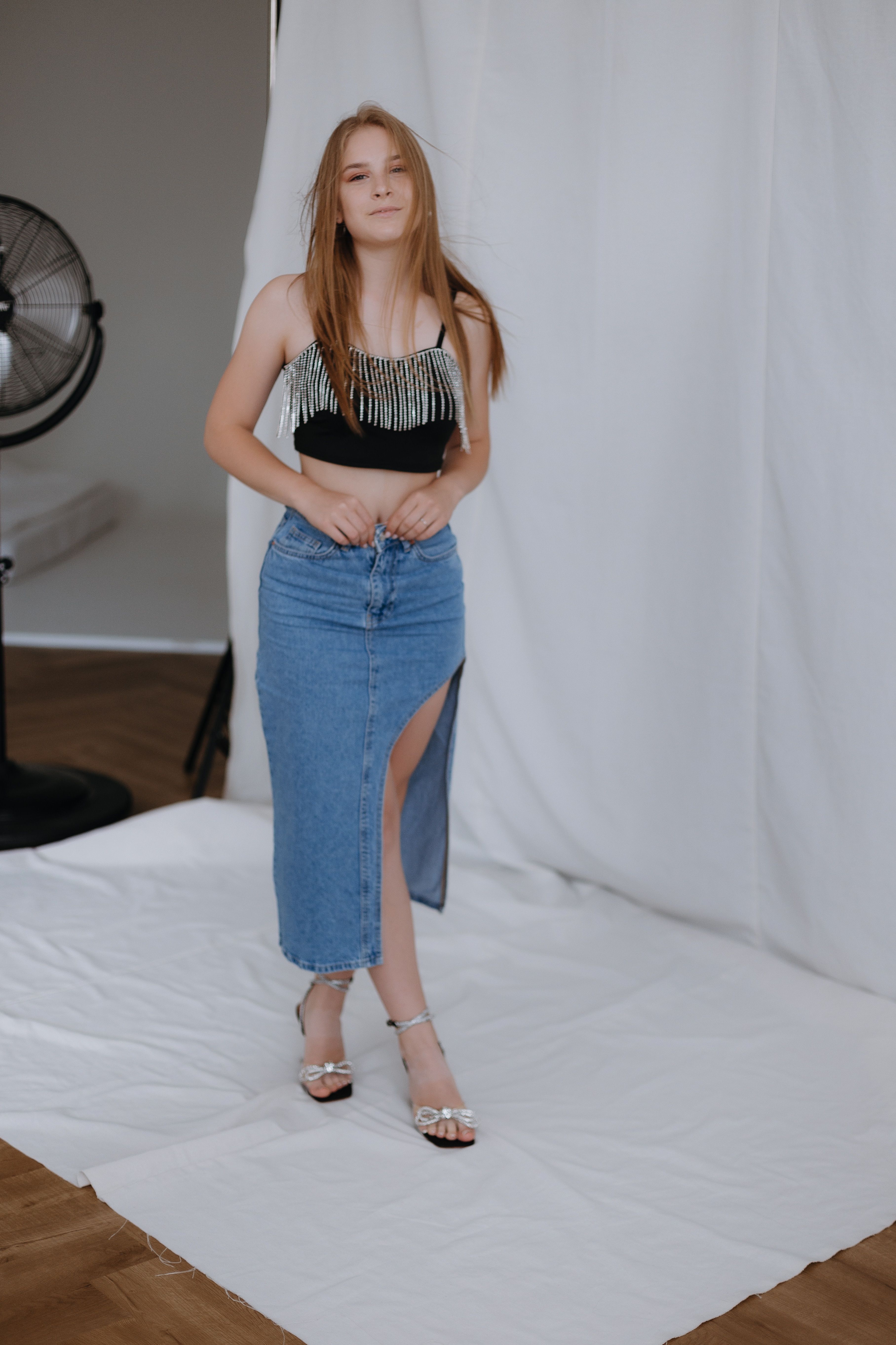 Stylish Young Woman Posing in Studio · Free Stock Photo