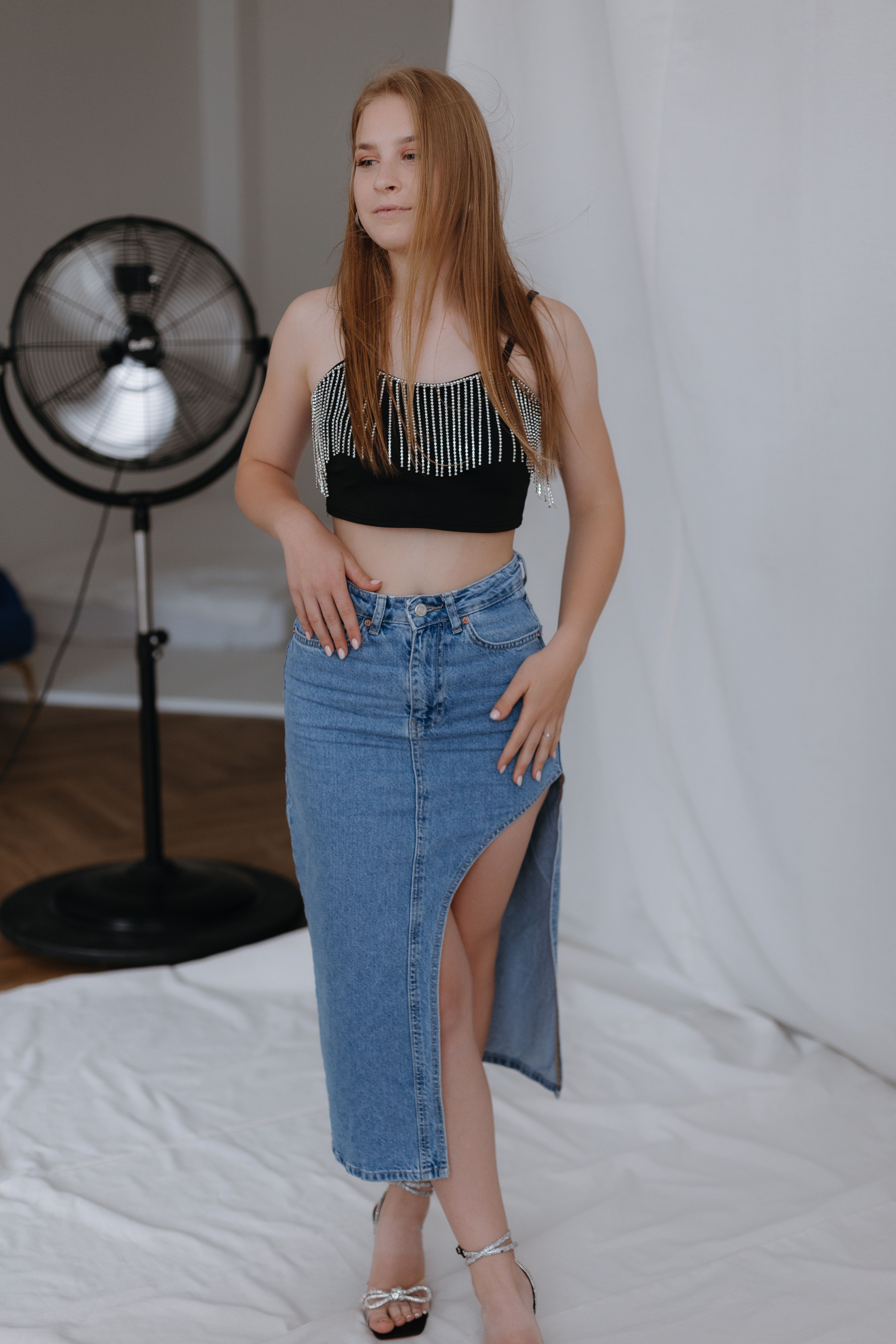 Stylish Young Woman Posing in Studio · Free Stock Photo