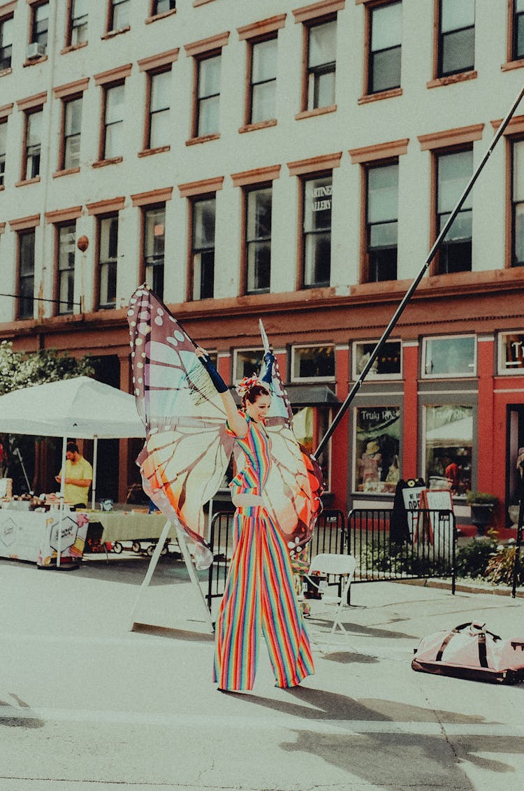 Woman In Butterfly Costume On Parade