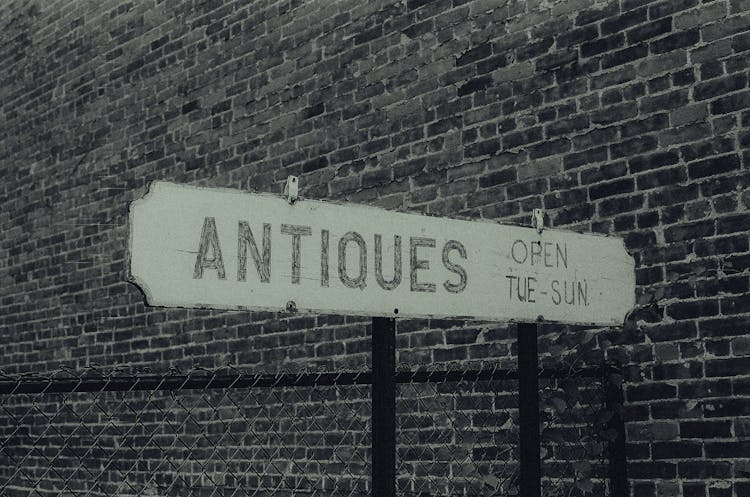 Sign Of Store With Antique