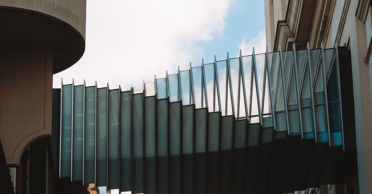 Two Building Connection A Connection between Two Buildings in City · Free Stock Photo