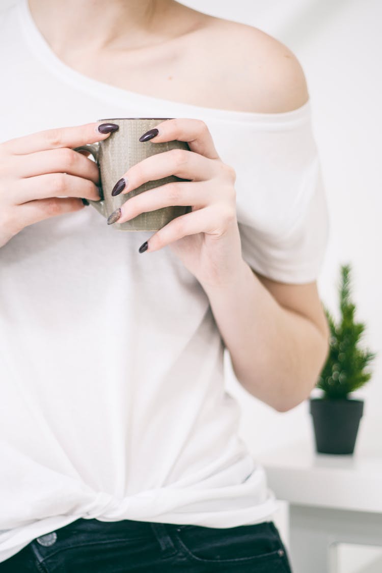 Photo Of Woman Holding Mug