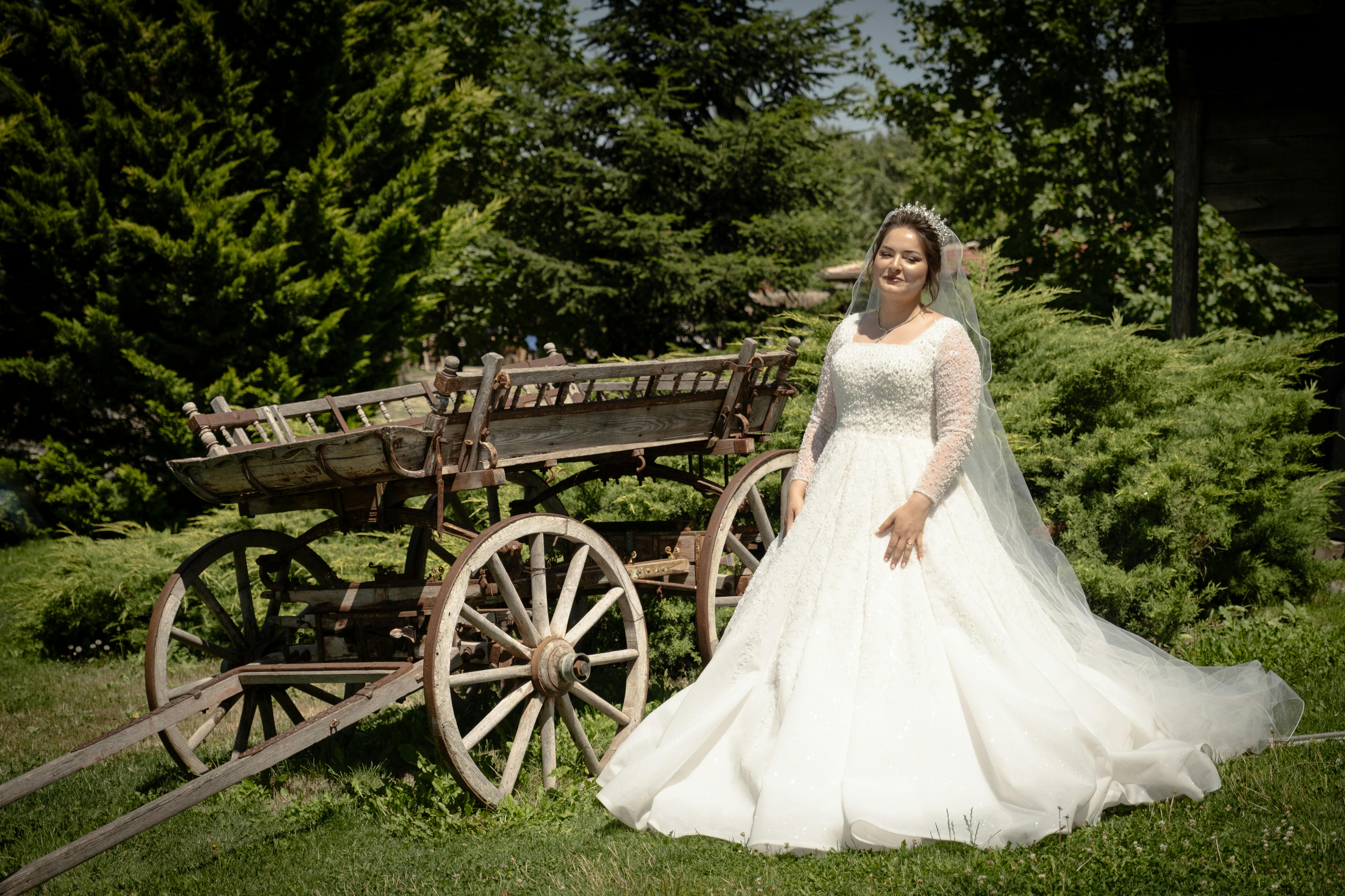 Bride Sitting in Retro Car at Wedding · Free Stock Photo