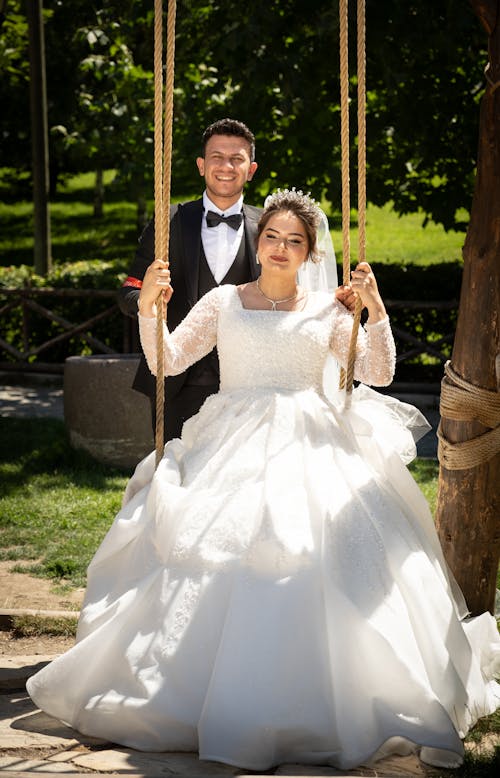 Bride and Groom Posing Outside 