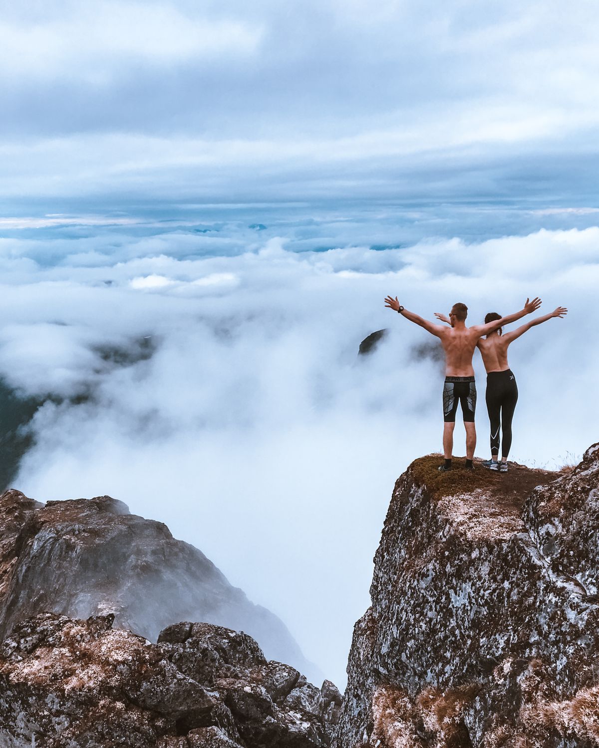 Scenic Photo of People Standing on Cliff · Free Stock Photo