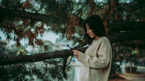 Photo of Woman Wearing Sweater