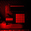 Red close view of a Native Instruments Maschine drums machine in a recording studio at Orbital 101 Studio Marseille