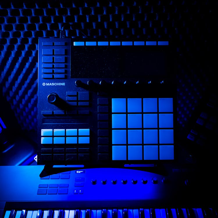 Blue close view of a Native Instruments Maschine drums machine in a ...