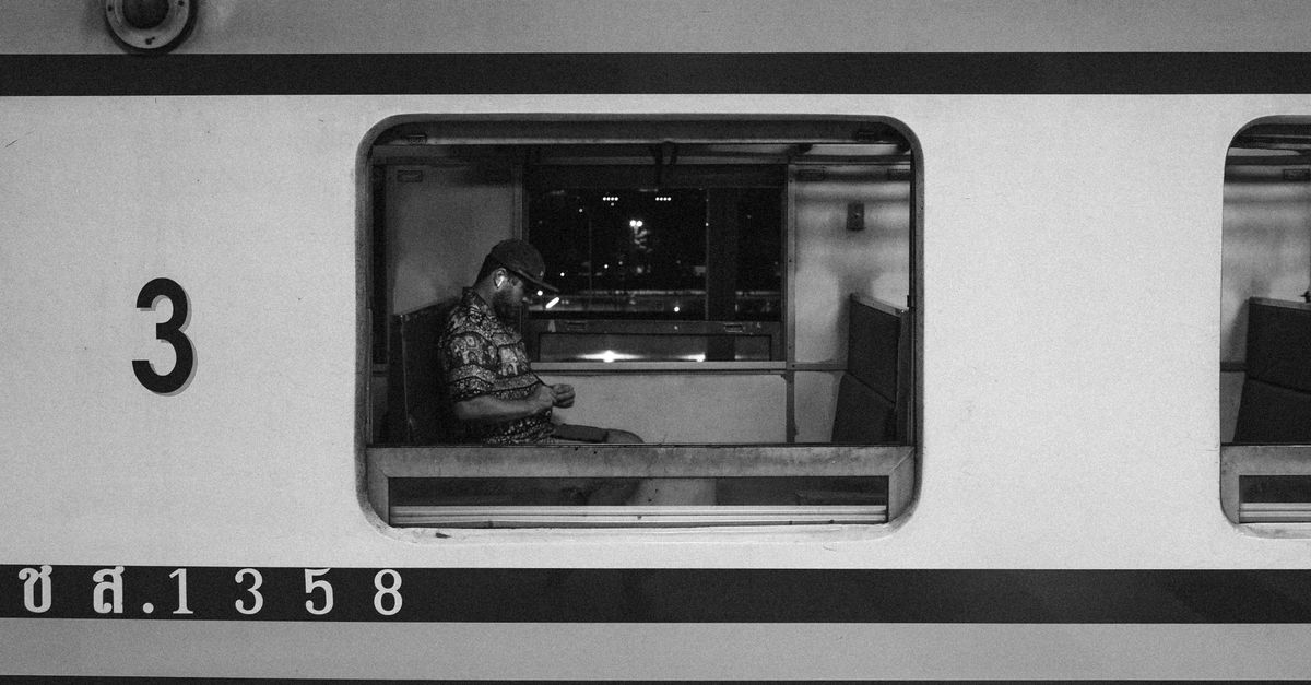 Metro Train Windows Man behind Metro Train Window · Free Stock Photo