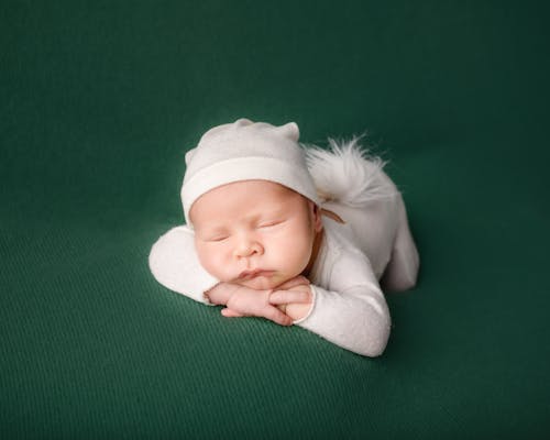 Adorable Sleeping on Belly Newborn