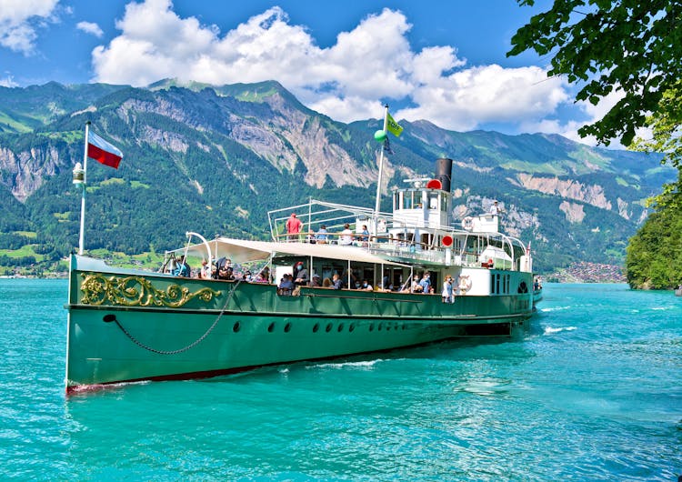 People Sailing On Ship On River