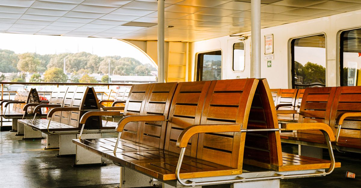 Inside of a Ship with Wooden Seats · Free Stock Photo