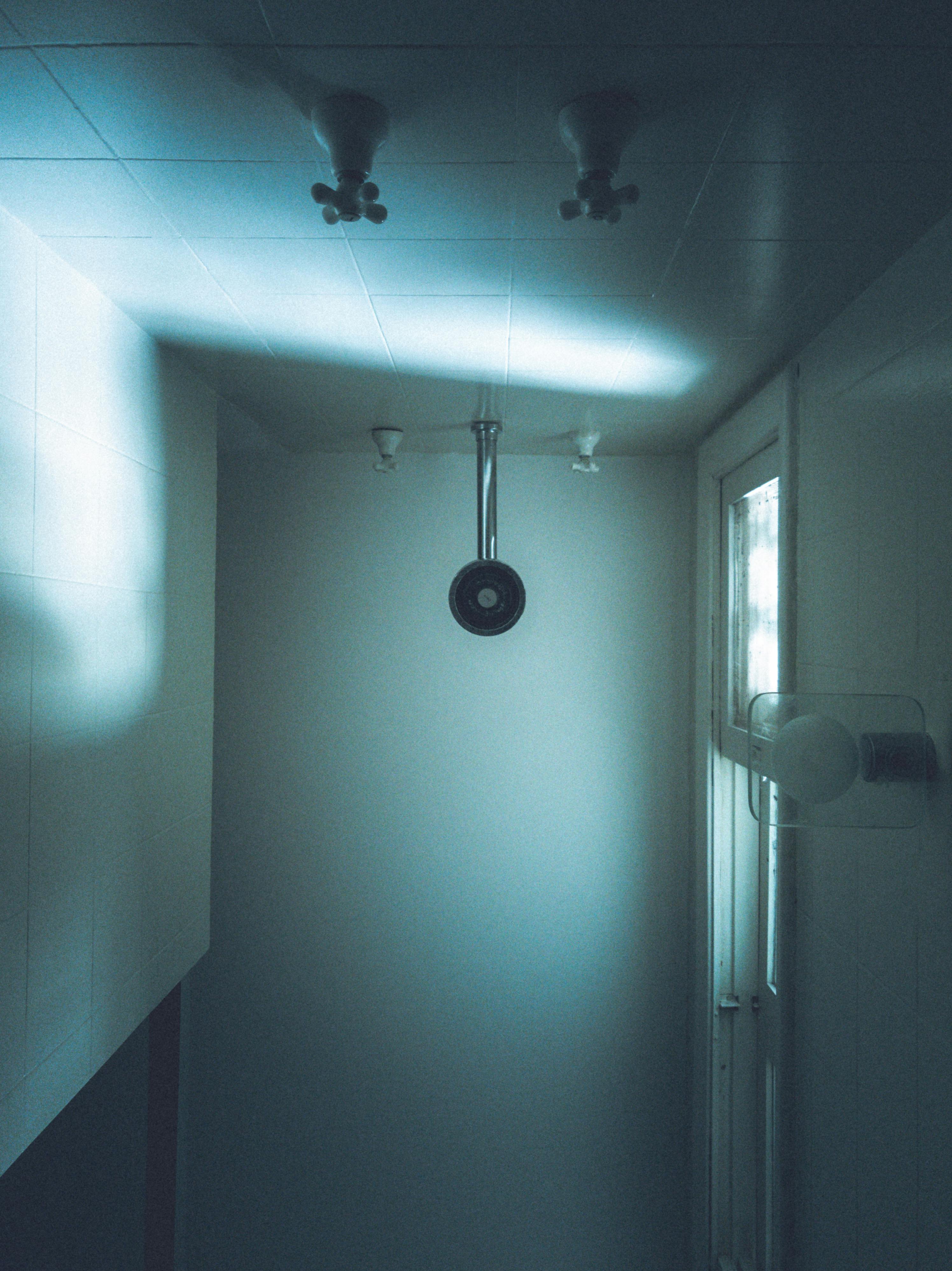 Ballet dancers practicing at the barre in a studio