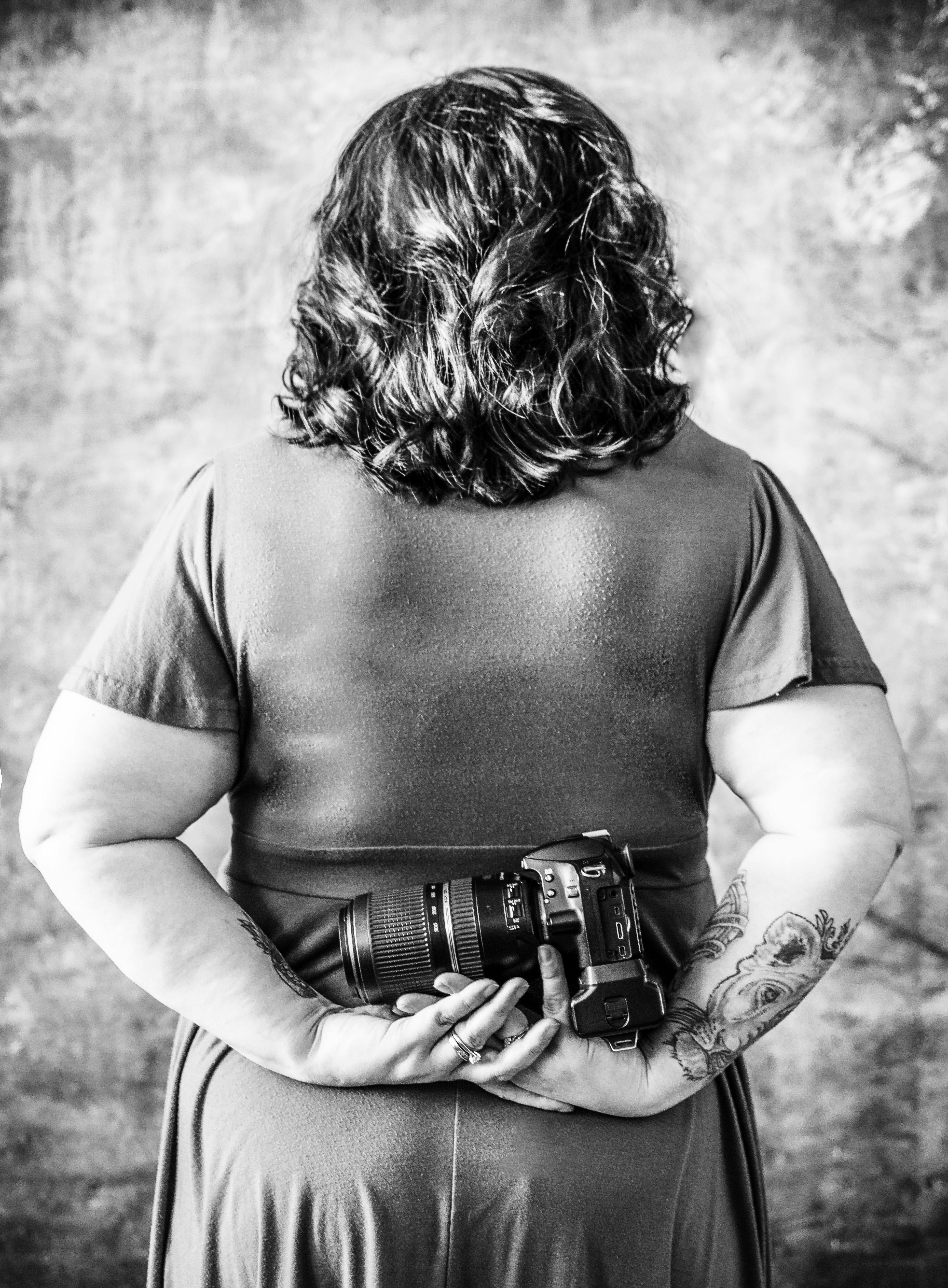Free stock photo of black and white, from the back, portrait with camera