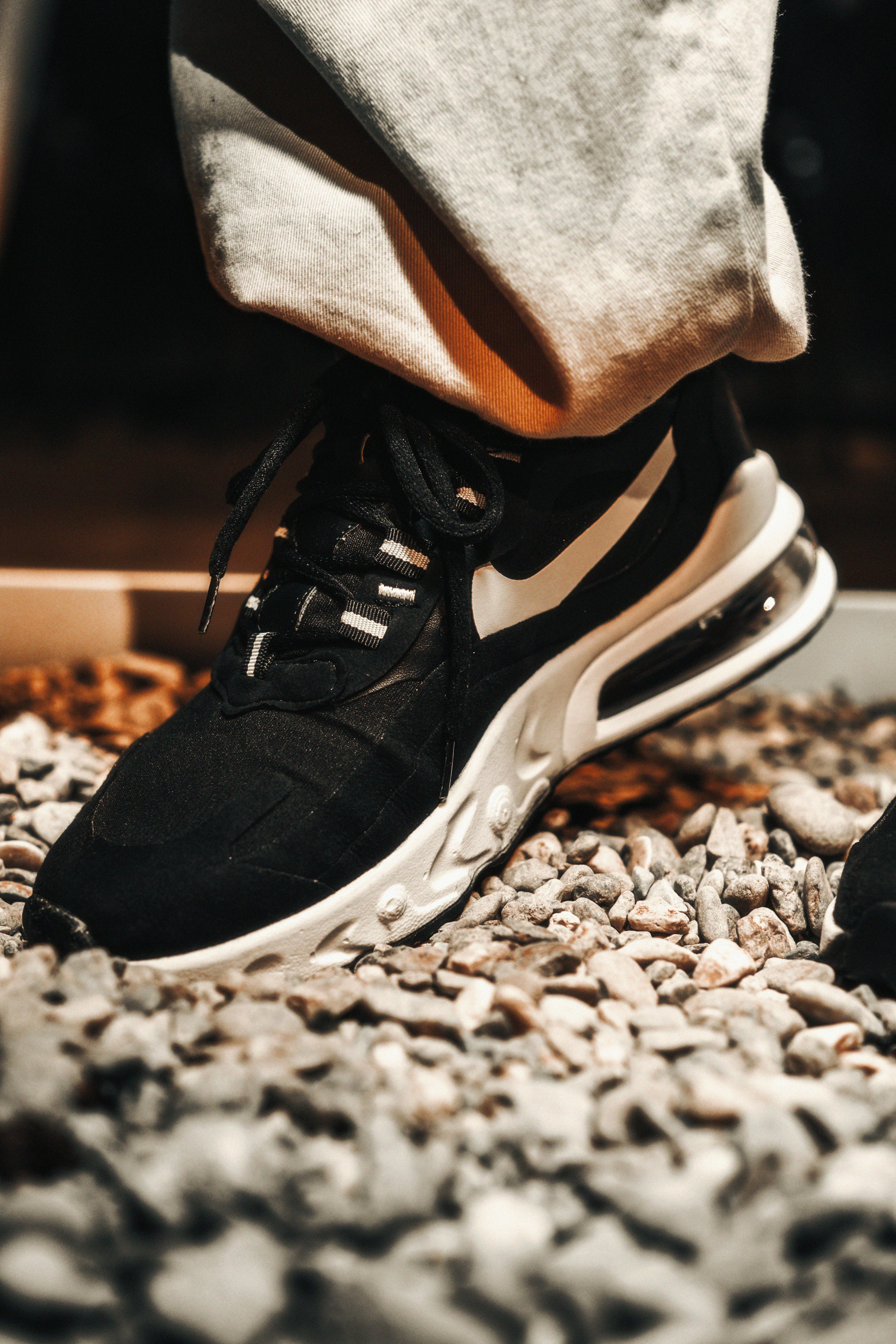 Pair of Blue White Nike Air Jordan Sneakers on a Black Background · Free  Stock Photo