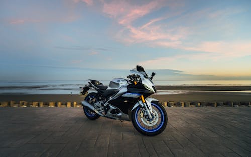 Yamaha YZF-R15 on Promenade by Beach and Sea at Dusk