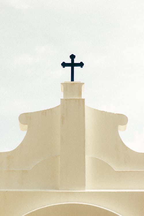 Simple Church Facade with Holy Cross on Top