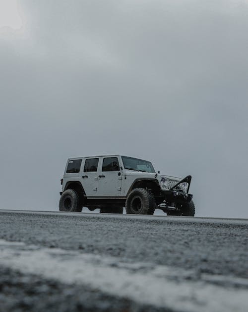 Ground Shot of a Jeep on the Road