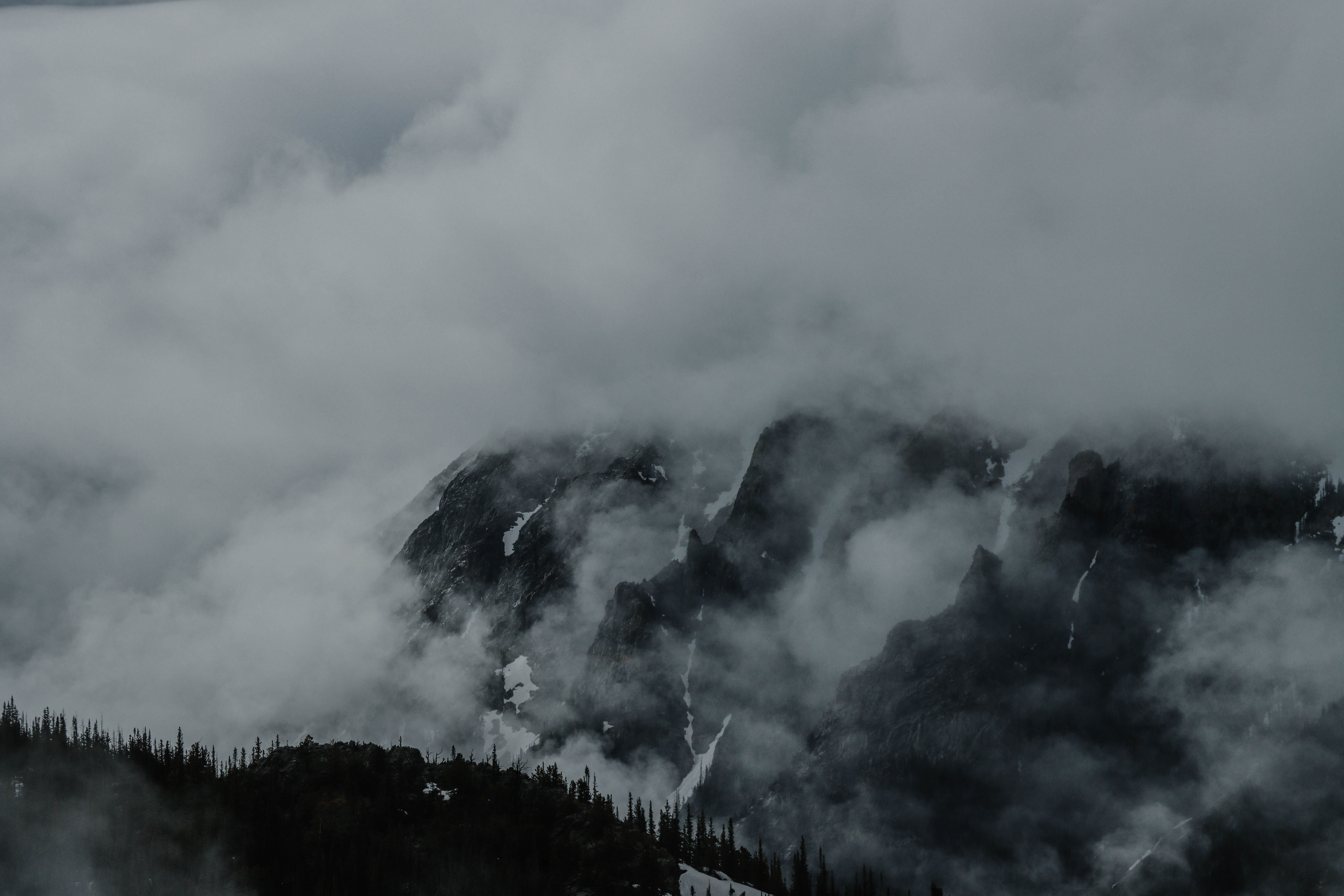 Clouds over Rocky Mountain on Cold Day · Free Stock Photo