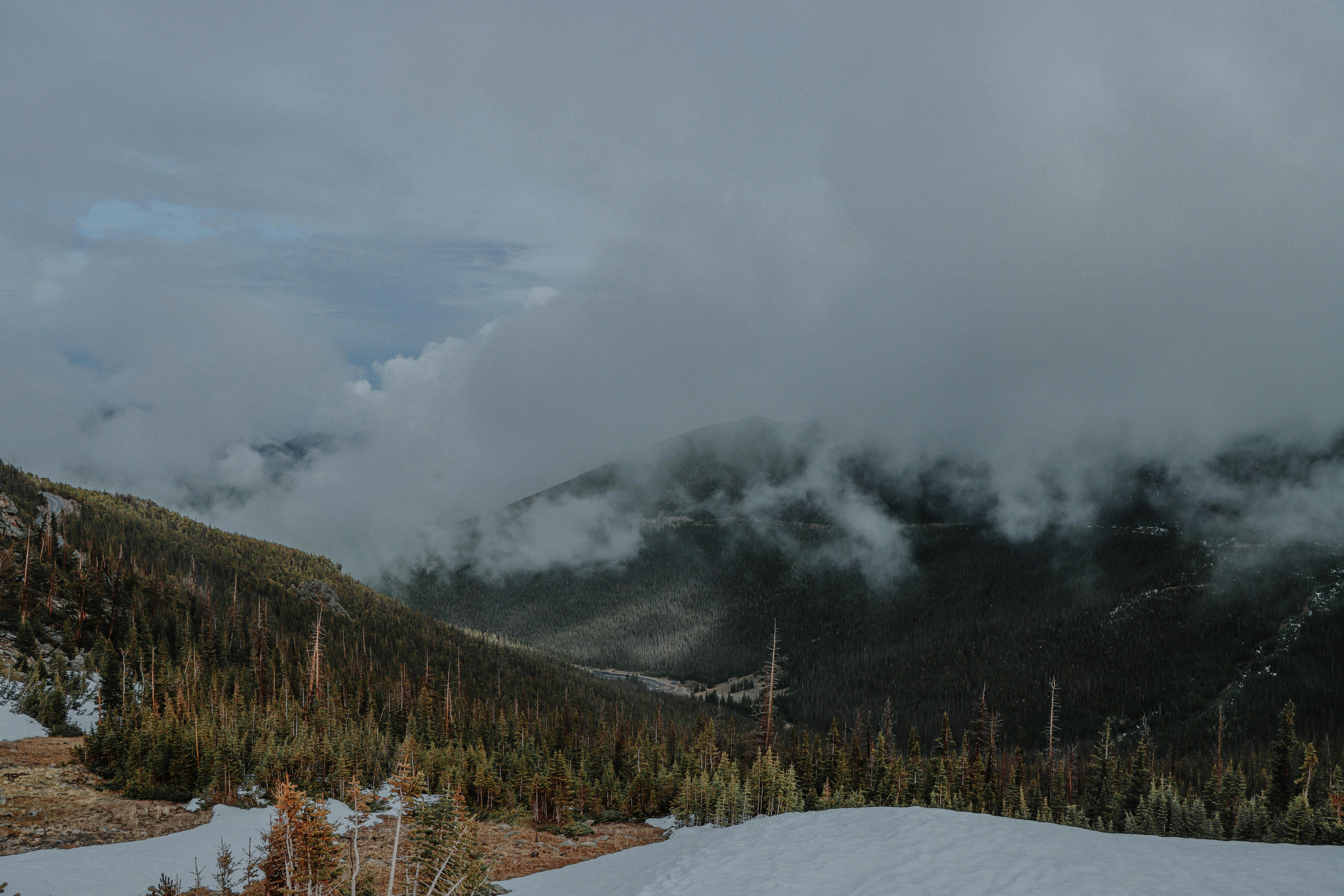 dense clouds over mountains in colorado usa