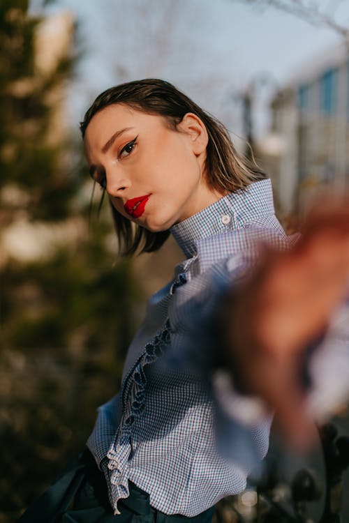 Young Fashionable Woman Posing Outside 