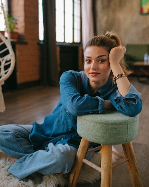 Woman Posing on a Stool