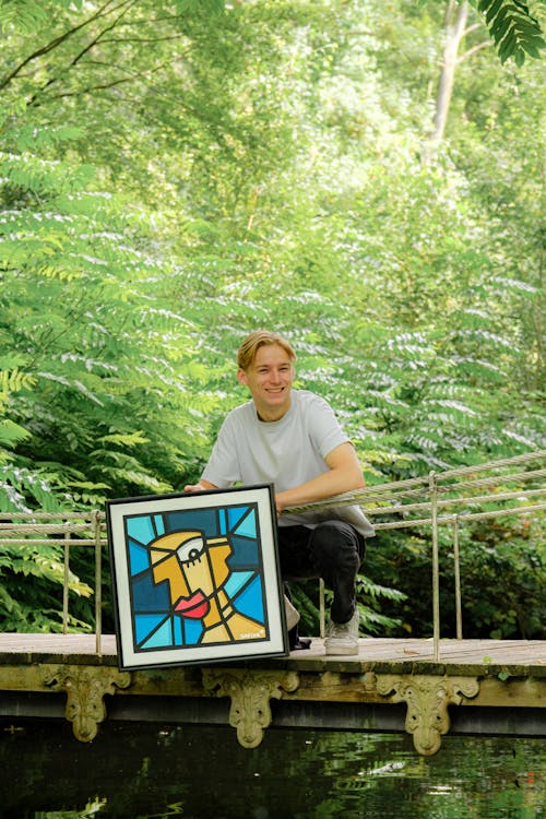 Artist With Painting