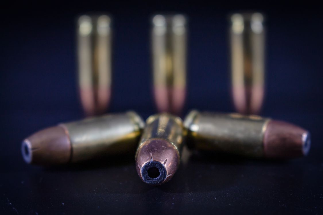 Close up of Bullets Lying Down · Free Stock Photo