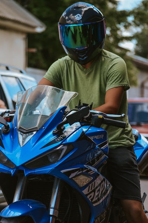 Man in Helmet on Motorcycle