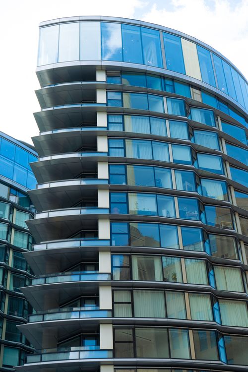 Free A striking glass facade of a contemporary urban building, highlighting modern architecture in London. Stock Photo