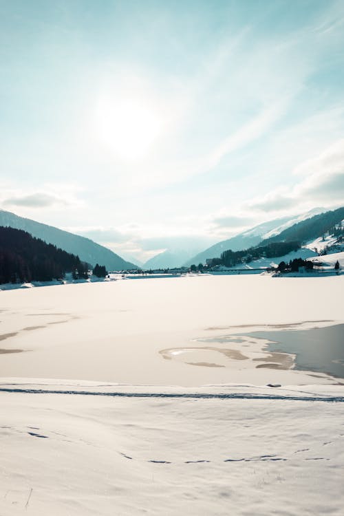 View of a Frozen Lake between Mountains