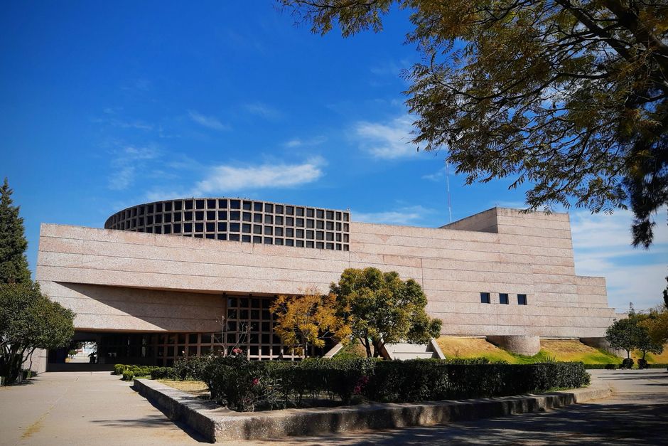 Modern private hospital exterior in a Mexican tourist city