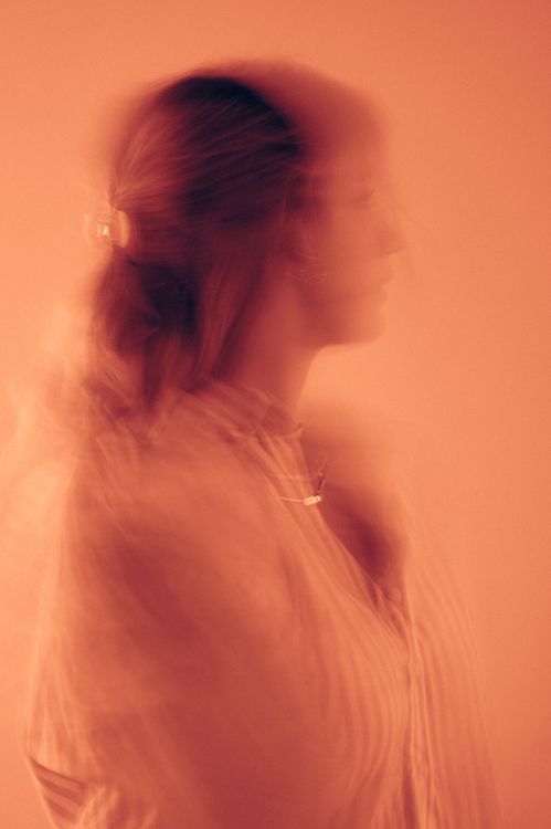 A Blurred Photo of a Woman · Free Stock Photo