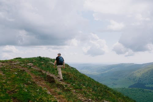 Man Hiking on Hill