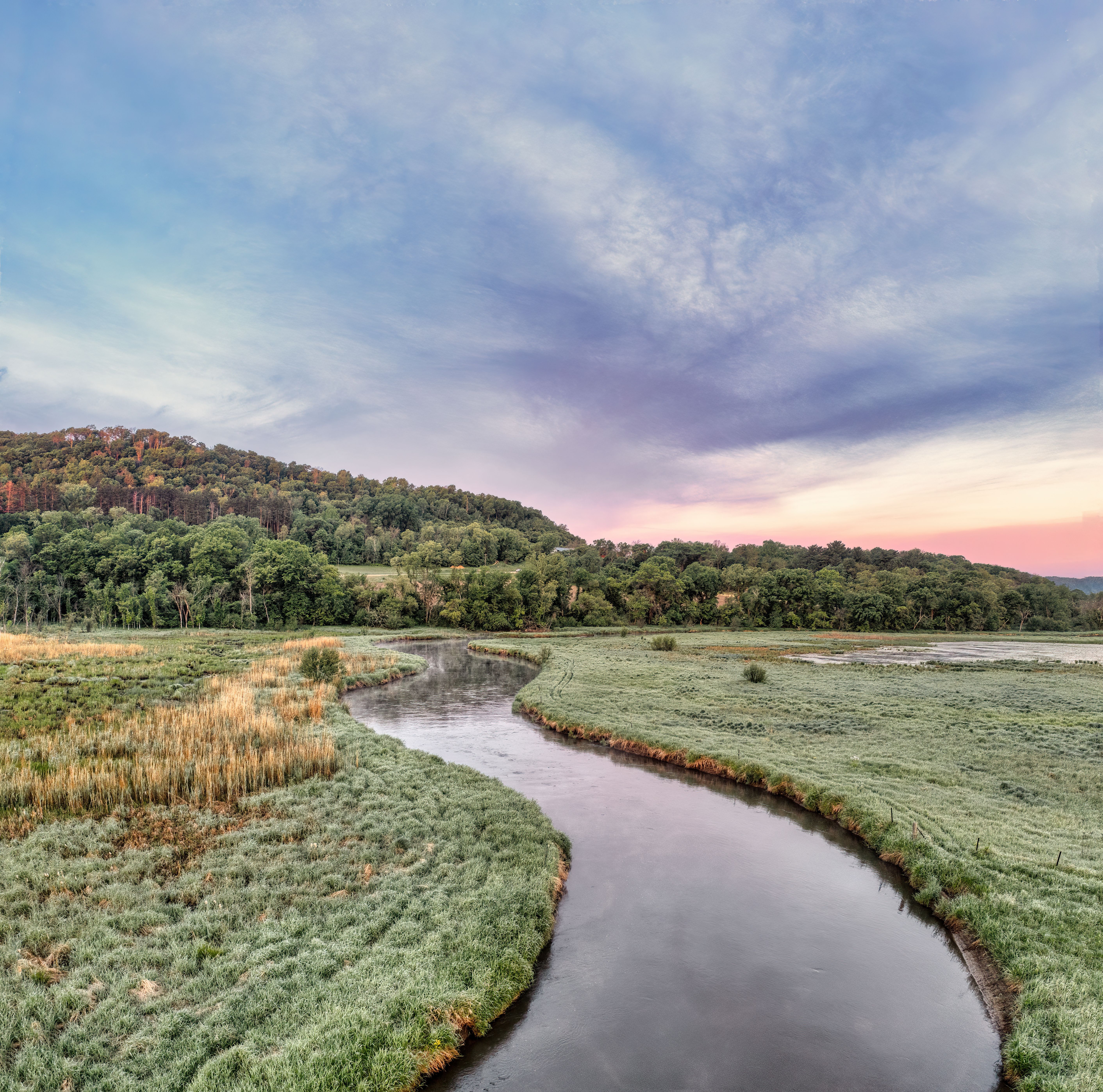 River in a Grassy Valley · Free Stock Photo