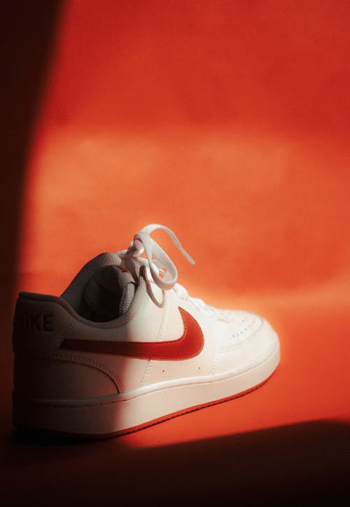 White Shoe on Red Background
